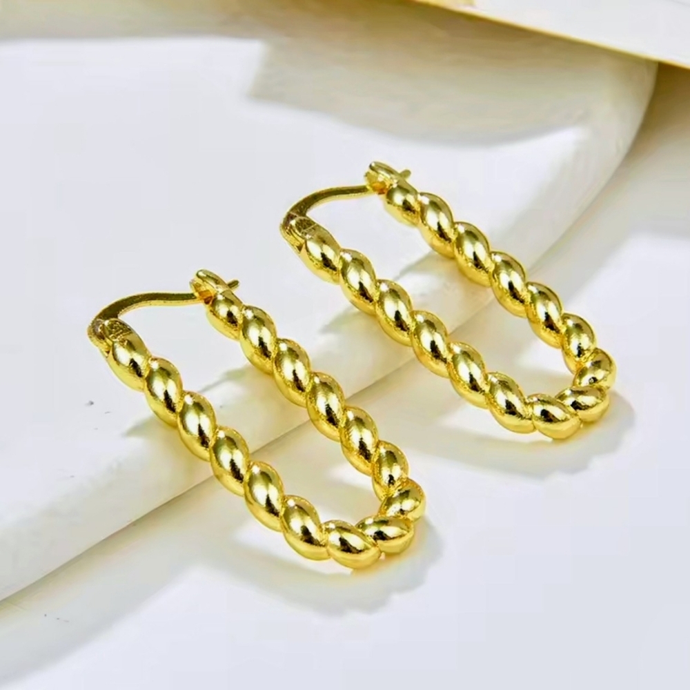 Textured rope croissant hoop earrings; gold plated brass; 1.1"x.56x.14";nwot